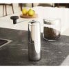 Moedor de café lento Alessi KT01 para degustar o melhor café em casa. Com design elegante e funcional, ideal para apreciadores de café.
