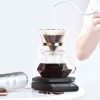 Gotas de café caindo no Gotejador de vidro de parede dupla Brewista Tornado Duo, um equipamento de qualidade para café. Compre online agora.