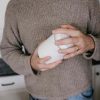 Content: Recipiente a vácuo Fellow Atmos para café, aço branco fosco - Armazene seus grãos com frescor. Compre online!