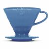 Gotejador de café em cerâmica Hario V60 tamanho 02 para infusionar sabores intensos. Ferramenta essencial para apreciar um café aromático. Compre já!
