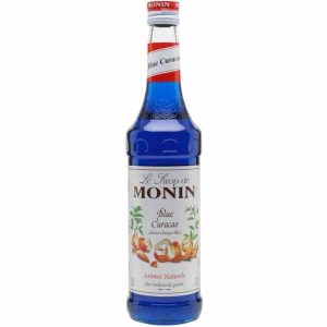 Xarope Monin Blue Curaçao 700 ml - Delicie-se com o sabor intenso deste xarope de alta qualidade para drinks exóticos. Compre online!