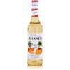 Xarope de Manga Monin 700 ml - Delicie-se com o sabor exótico da manga neste xarope de qualidade premium. Ideal para cocktails e sobremesas. Compre online!