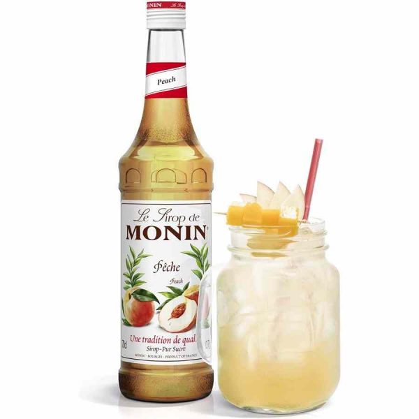 Xarope de Pêssego Monin 700 ml - Delicie-se com a doçura e aroma irresistíveis deste xarope de pêssego premium. Ideal para bebidas e sobremesas.