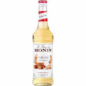 Xarope de Noz Caramelo Monin 700 ml - Delicie-se com este xarope de alta qualidade para bebidas. Perfeito para cocktails e sobremesas!