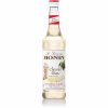 Xarope de Chocolate Branco Monin 700 ml - Delicie-se com o sabor requintado deste xarope premium para bebidas. Ideal para cocktails e sobremesas. Compre online!
