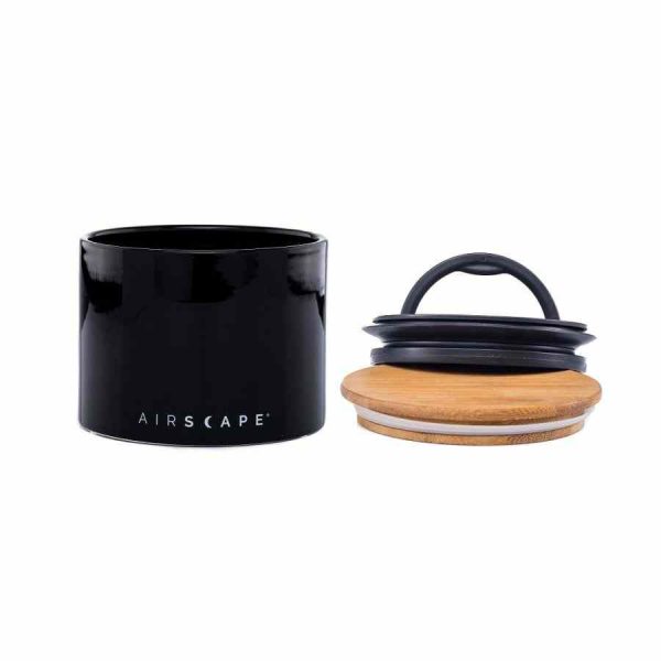Recipiente de armazenamento de cerâmica Airscape® de design planetário em obsidiana para manter alimentos frescos por mais tempo.